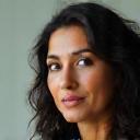 Headshot of Aisha Khan, Owner of Pure & Natural Cosmetics, looking passionate about her brand.